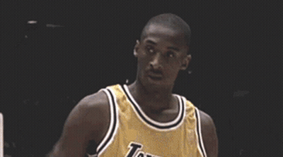 A Close Up Of A Basketball Player Wearing A Purple Jersey GIF