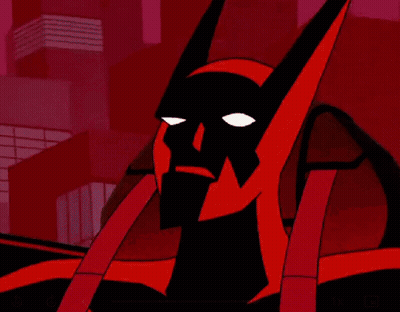 A Close Up Of A Batman Cartoon Character With A Red Background And Buildings In The Background . GIF