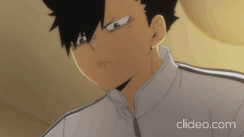 A Close Up Of A Black Haired Anime Character With The Website Clideo.com In The Corner GIF
