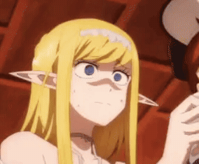 A Close Up Of A Blonde Anime Girl With Elf Ears Looking At Something . GIF