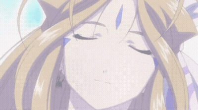 A Close Up Of A Blonde Anime Girl With Her Eyes Closed GIF