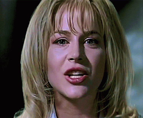 Blonde Woman Close Up Serious Face GIF