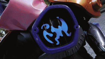 A Close Up Of A Blue And Purple Item With A Monkey On It GIF
