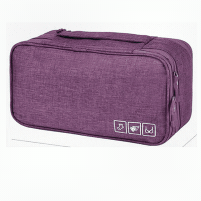 A Close Up Of A Blue Bag With Flowers On It GIF
