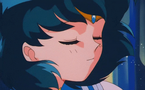 A Close Up Of A Blue Haired Anime Character GIF