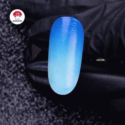 A Close Up Of A Blue Nail With The Words Nails Inspiration On The Corner GIF