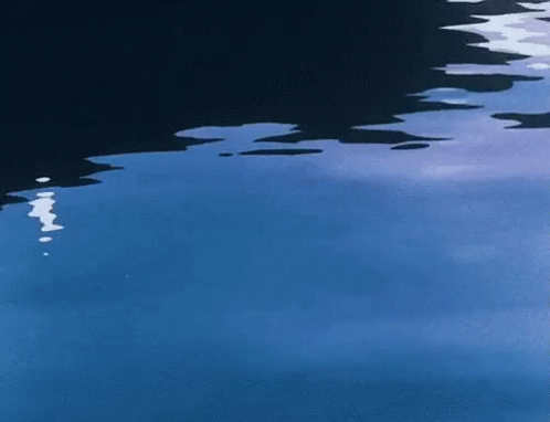 A Close Up Of A Blue Water Surface GIF