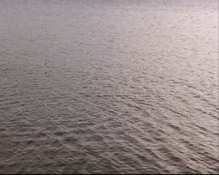 A Close Up Of A Body Of Water Shows The Waves GIF