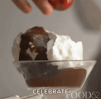 A Close Up Of A Bowl Of Ice Cream With The Words Celebrate Food52 On The Bottom GIF