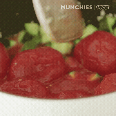 A Close Up Of A Bowl Of Tomatoes With The Words Munchies Vice Written On The Bottom GIF