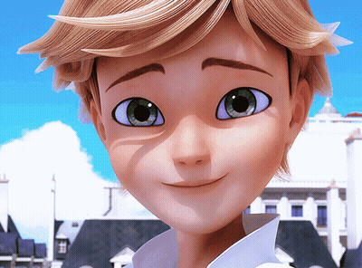 A Close Up Of A Boy 'S Face With Green Eyes GIF