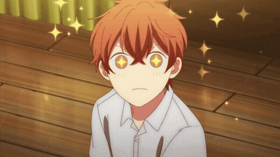 A Close Up Of A Boy 'S Face With His Eyes Shining Brightly GIF