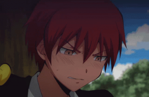 A Close Up Of A Boy With Red Hair GIF