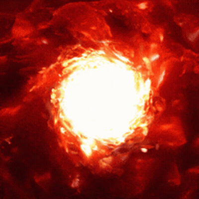 A Close Up Of A Bright Light In A Red Background GIF
