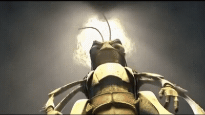 A Close Up Of A Bug With A Light Coming Out Of It 'S Head GIF