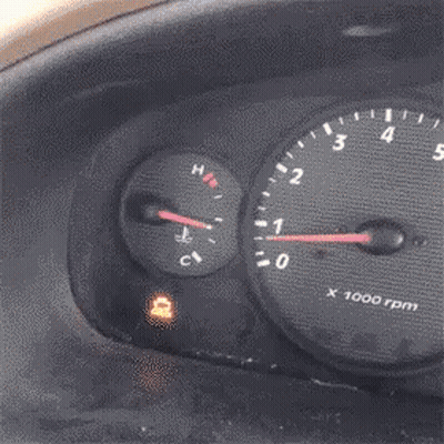 A Close Up Of A Car Dashboard With A Tachometer That Says X 1000 GIF