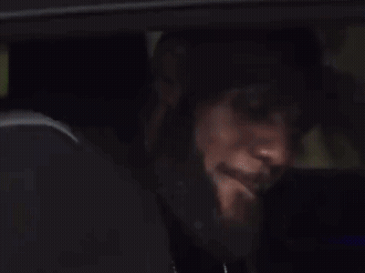 A Close Up Of A Car 'S Fender With A Light On It GIF
