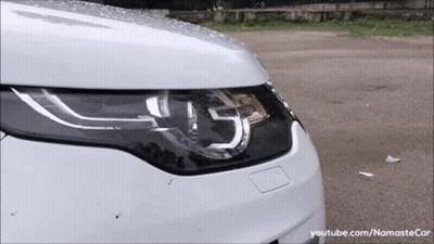 A Close Up Of A Car 'S Headlight With Youtube.com/namastecar Written On The Bottom GIF