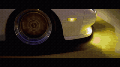 A Close Up Of A Car 'S Wheel With A Sticker On It That Says ' Bbs ' GIF