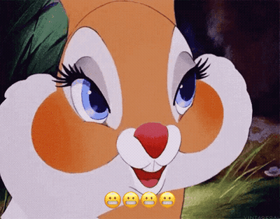 A Close Up Of A Cartoon Bunny With Four Smiley Faces On It GIF