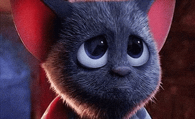 A Close Up Of A Cartoon Cat With Big Blue Eyes And Red Ears . GIF