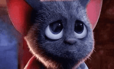 A Close Up Of A Cartoon Cat With Big Eyes Wearing A Red Hat . GIF