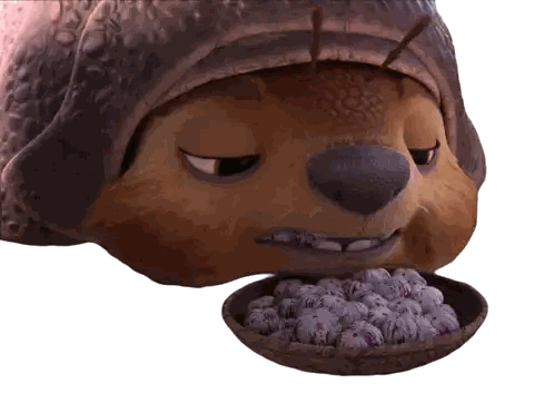 A Close Up Of A Cartoon Character Eating A Bowl Of Nuts Sticker