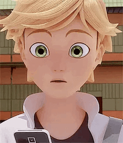 A Close Up Of A Cartoon Character Holding A Cell Phone And Making A Surprised Face . GIF