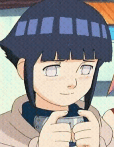 A Close Up Of A Cartoon Character Holding A Cell Phone In Her Hand . GIF