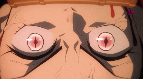A Close Up Of A Cartoon Character 'S Eyes With A Red Pupil GIF