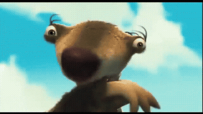 A Close Up Of A Cartoon Character 'S Face Against A Blue Sky GIF