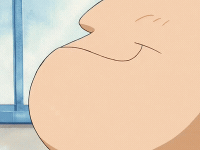 A Close Up Of A Cartoon Character 'S Face And Eyes GIF