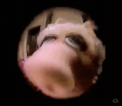 A Close Up Of A Cartoon Character 'S Face With A Black Background GIF