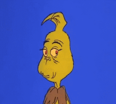A Close Up Of A Cartoon Character 'S Face With A Blue Background . GIF
