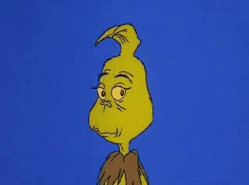 A Close Up Of A Cartoon Character 'S Face With A Blue Background . GIF