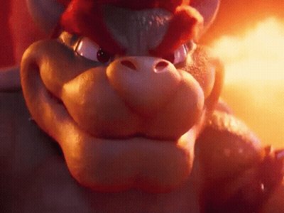 A Close Up Of A Cartoon Character 'S Face With A Fire Background . GIF
