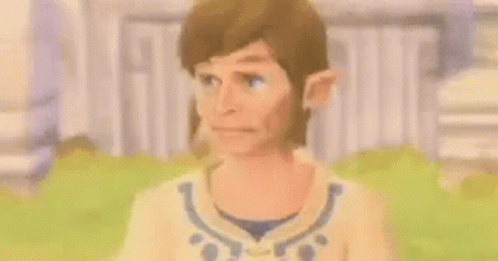 A Close Up Of A Cartoon Character 'S Face With A Green Hair And Ears . GIF