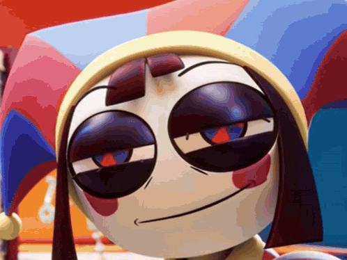 A Close Up Of A Cartoon Character 'S Face With A Jester Hat On GIF