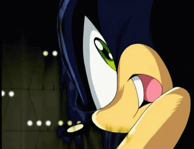A Close Up Of A Cartoon Character 'S Face With A Pink Tongue Sticking Out GIF