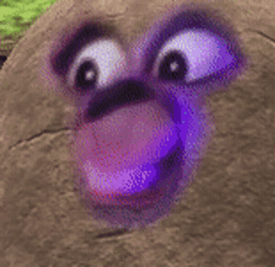 A Close Up Of A Cartoon Character 'S Face With A Purple Eye . GIF