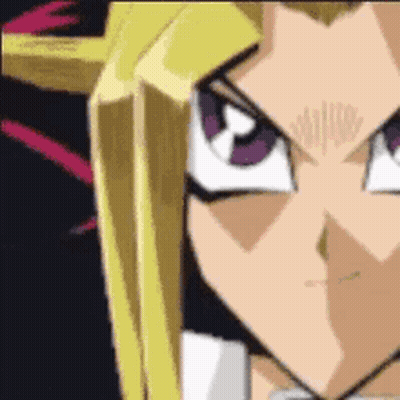 A Close Up Of A Cartoon Character 'S Face With A Purple Eye . GIF
