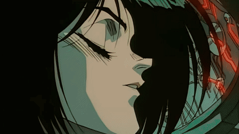 A Close Up Of A Cartoon Character 'S Face With A Red Light Behind Her GIF