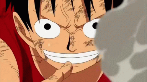 A Close Up Of A Cartoon Character 'S Face With A Red Shirt On GIF