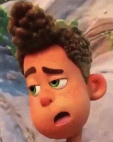 a close up of a cartoon character 's face with a surprised expression .