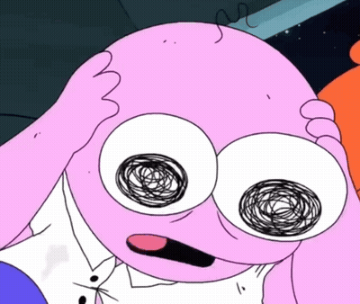A Close Up Of A Cartoon Character 'S Face With A Swirl Of Eyes GIF