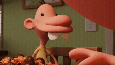 A Close Up Of A Cartoon Character 'S Face With A White Tooth GIF