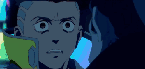 A Close Up Of A Cartoon Character 'S Face With A Yellow Helmet On GIF
