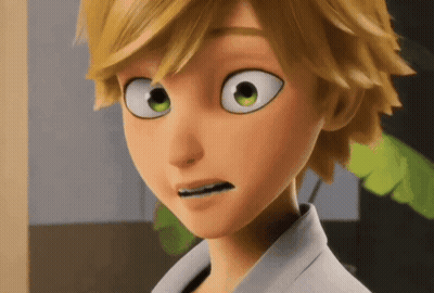A Close Up Of A Cartoon Character 'S Face With Big Green Eyes And A Surprised Look On His Face . GIF