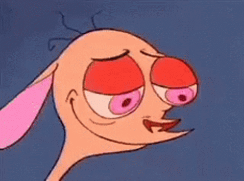 A Close Up Of A Cartoon Character 'S Face With Big Pink Eyes And A Pink Ear . GIF