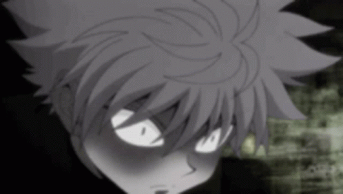 A Close Up Of A Cartoon Character 'S Face With Glowing Eyes And A Black Background . GIF